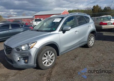 2016 Mazda Cx-5 Touring from USA, damaged, VIN JM3KE4CY2G0611460